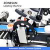 Automatic bottle turnover system for bottom labeling