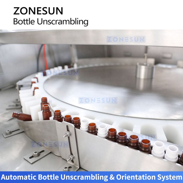 Automatic bottle unscrambling and orientation system