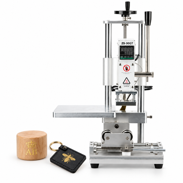 ZONESUN ZS-90GT Hot Foil Stamping Machine for Flat & Round Surfaces — machine with application samples on white background