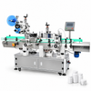 ZONESUN ZS-TB822D Automatic Round Bottle and Cap Labeling Machine — machine with application materials on white background