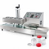 ZONESUN ZS-FK6000A Air-Cooled Continuous Induction Foil Sealer — machine with application materials on white background