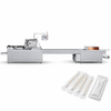 ZONESUN ZS-HYS420 Automatic Wrapping Machine for Hygienic Products — machine with application materials on white background