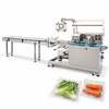 ZONESUN ZS-HY680 Horizontal Vegetable Packaging Sealing Machine — machine with application materials on white background