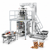 ZS-GW10 Automatic Granule Feeding Weighing Filling Sealing Machine With Metal Detector — machine with application materials on white background