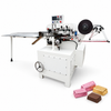 ZONESUN ZS-HFW1 High-Speed Chocolate Wrapping Machine for Professional Packaging — machine with application materials on white background