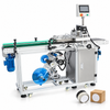 ZONESUN ZS-TB125 Automatic Bottom Labeling Machine for Bottles Boxes and Containers — machine with application materials on white background