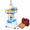 ZONESUN ZS-819Q Automatic Leather Logo Hot Foil Stamping Machine with application materials on white background